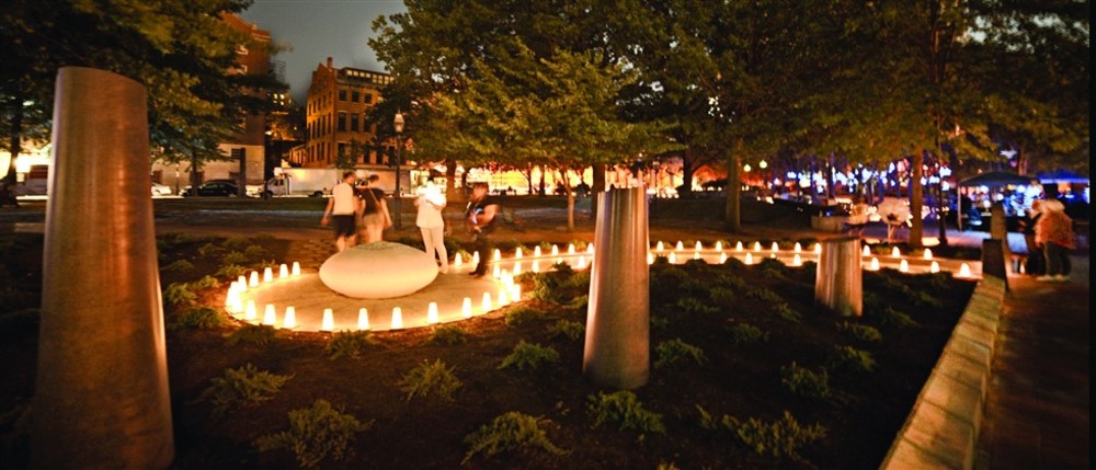 The Holocaust Memorial glows with 70 lanterns during the WaterFire lighting Aug. 29. /WATERFIRE PROVIDENCE, JOHN NICKERSON